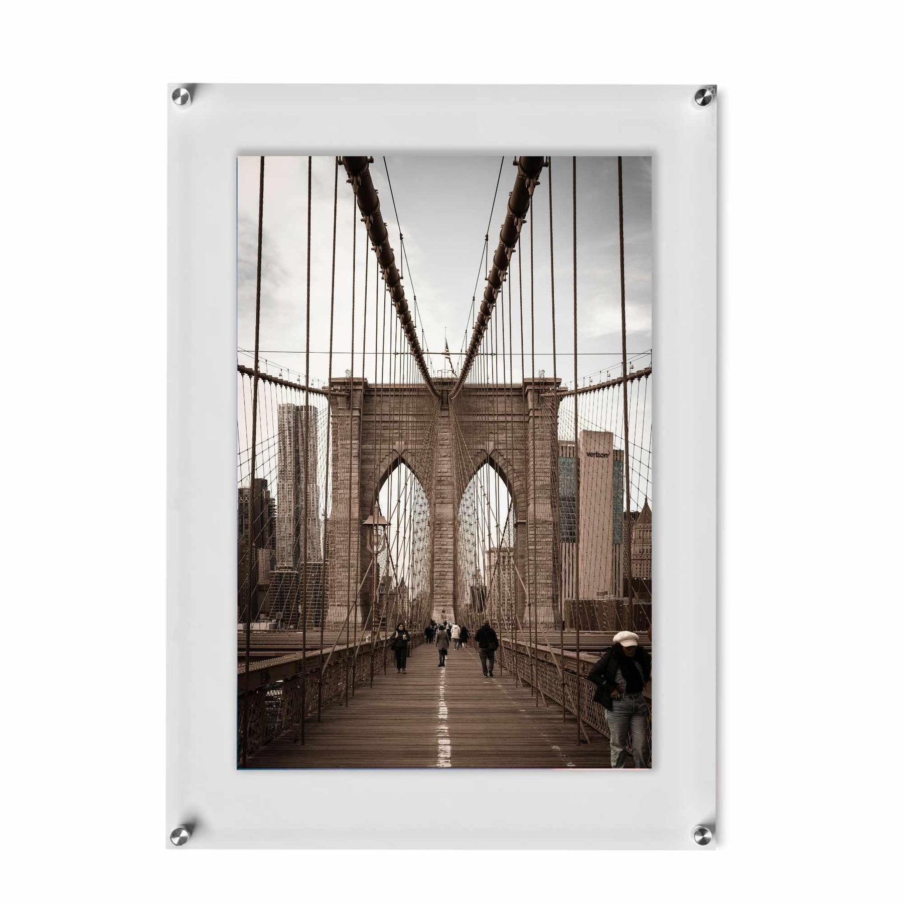 Floating acrylic picture frame with metal standoffs for a modern frameless wall display