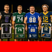 a group of framed sports jerseys on a wall