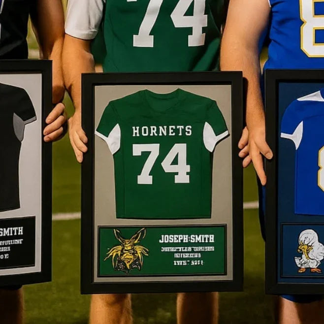 a group of framed baseball jerseys on a wall