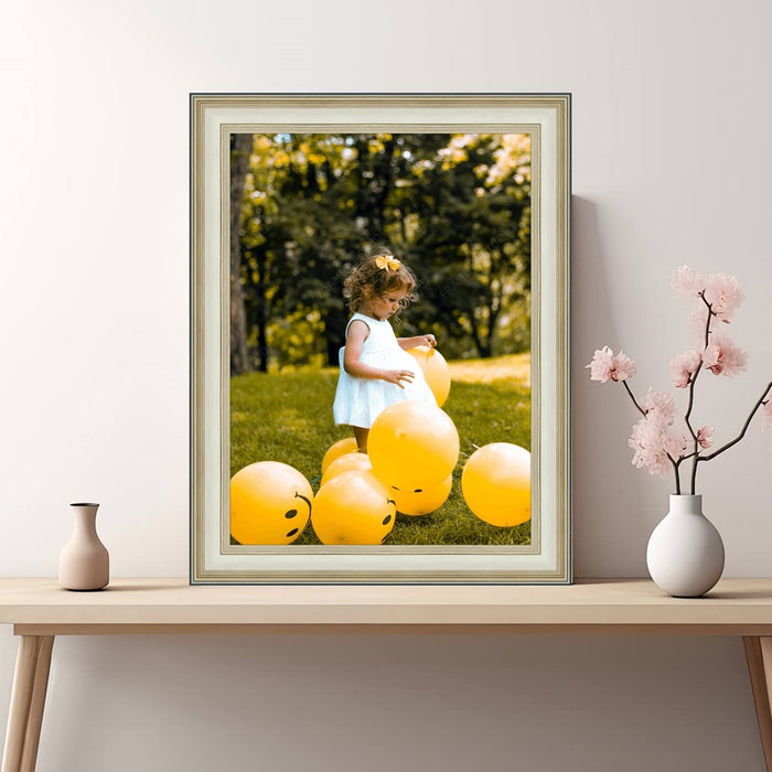 a picture of a little girl surrounded by balloons