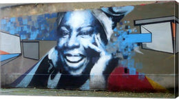 Graffiti of blue smiling women with abstract background somewhere in Gdynia