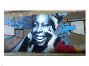 Graffiti of blue smiling women with abstract background somewhere in Gdynia