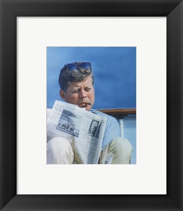 President Kennedy Reading the New York Times