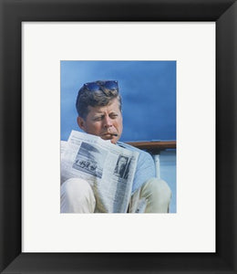 President Kennedy Reading the New York Times