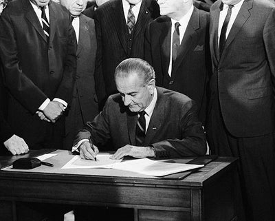President Lyndon B. Johnson Signing the Civil Rights Act of 1968 by McMahan Photo Archive Wall Art Décor 8 x 10 Art Print