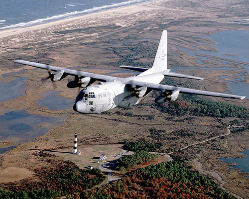 Framed C-130 Hercules Over Lighthouse, 2001 by McMahan Photo Archive