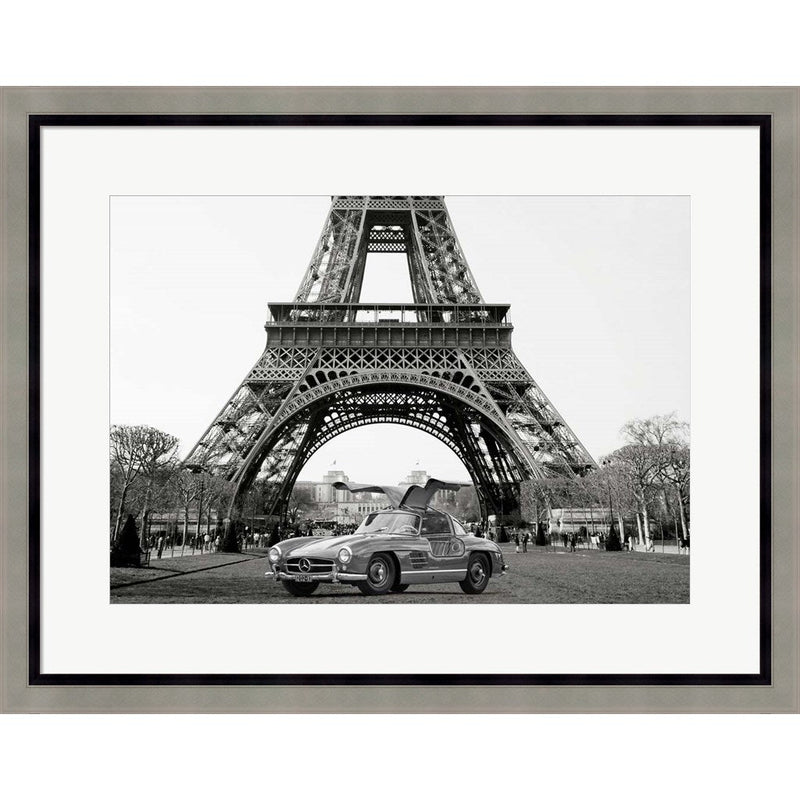 Roadster Under the Eiffel Tower (BW) by Gasoline Images, Framed Art