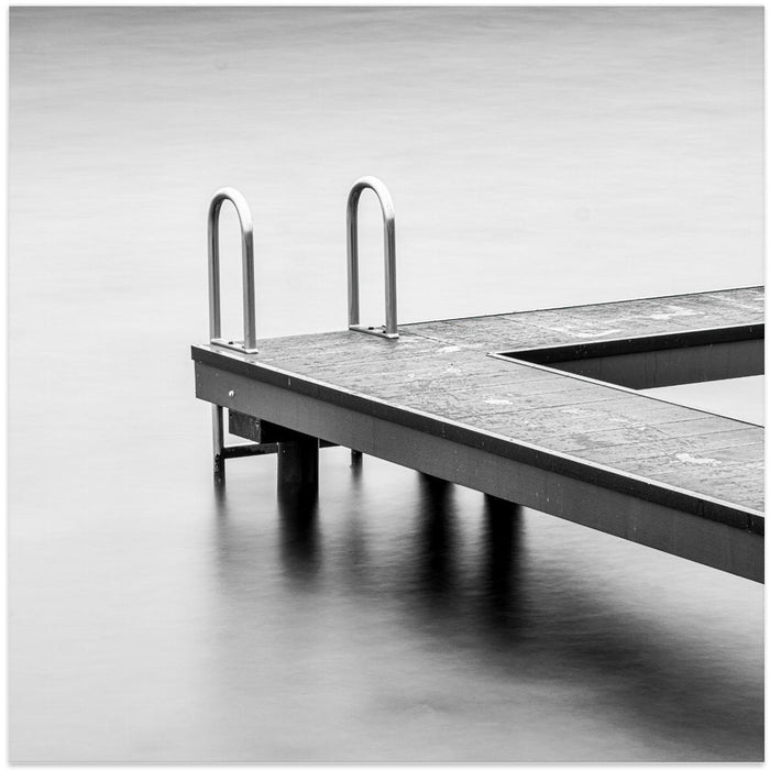A jetty in a lake Square Canvas Art Print
